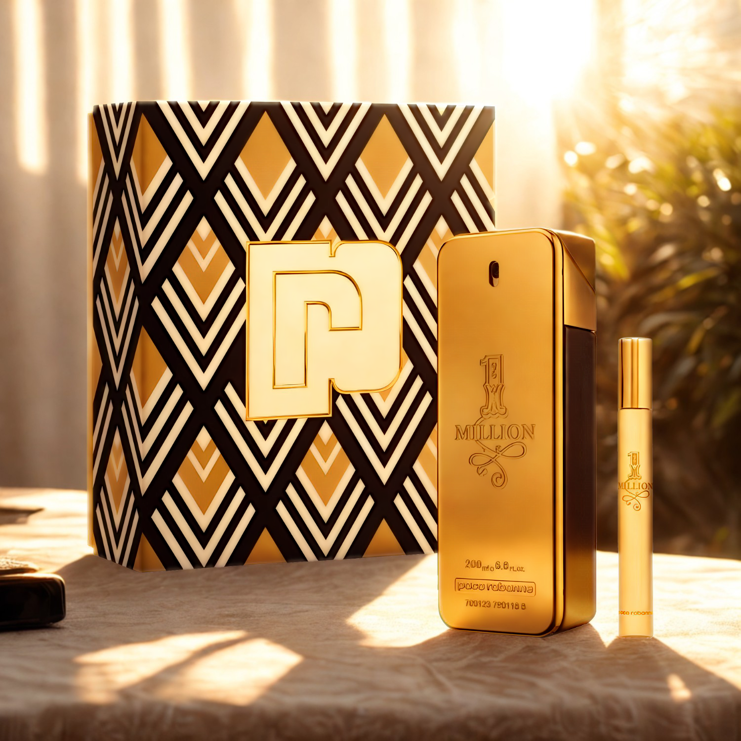 Kit masculino importado One Million Rabanne, disponível na Velyre, apresentado em uma superfície clara sob luz natural, destacando o brilho dourado do perfume Eau de Toilette de 200ml, o travel size de 10ml e a embalagem decorativa.