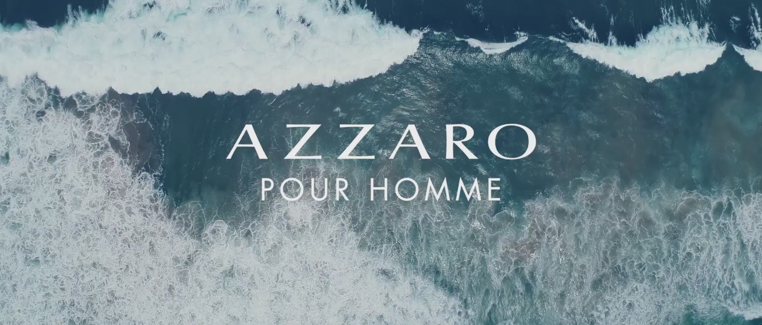 ídeo apresentando um homem confiante e elegante, incorporando a fragrância Azzaro Pour Homme, com cenas dele se preparando, interagindo romanticamente, e um close-up do elegante frasco de perfume. Enfatiza masculinidade, sedução e sofisticação.